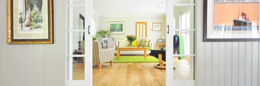 A perfectly staged home's living room is filled with natural light, ready for someone moving in Ottawa.