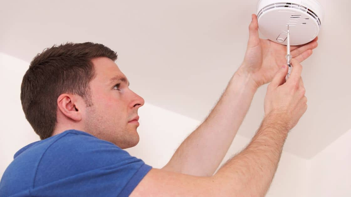 Installing smoke detectors and carbon monoxide alarms in a new house