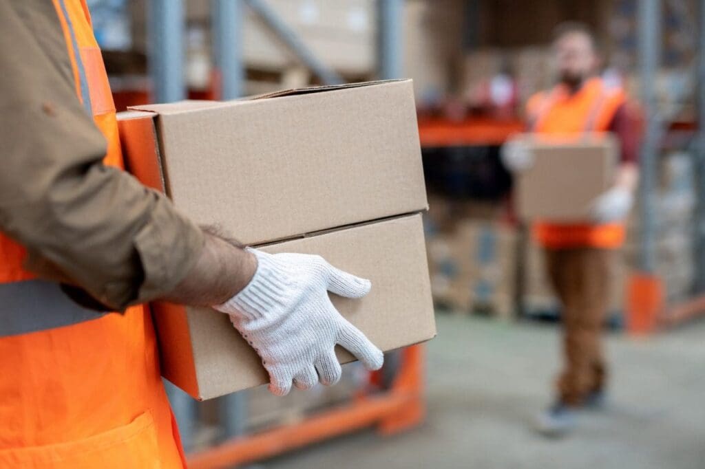 How I Handle Senior and Retirement Moves Across Perth ON, Stittsville, and Kanata 18 movers working at warehouse