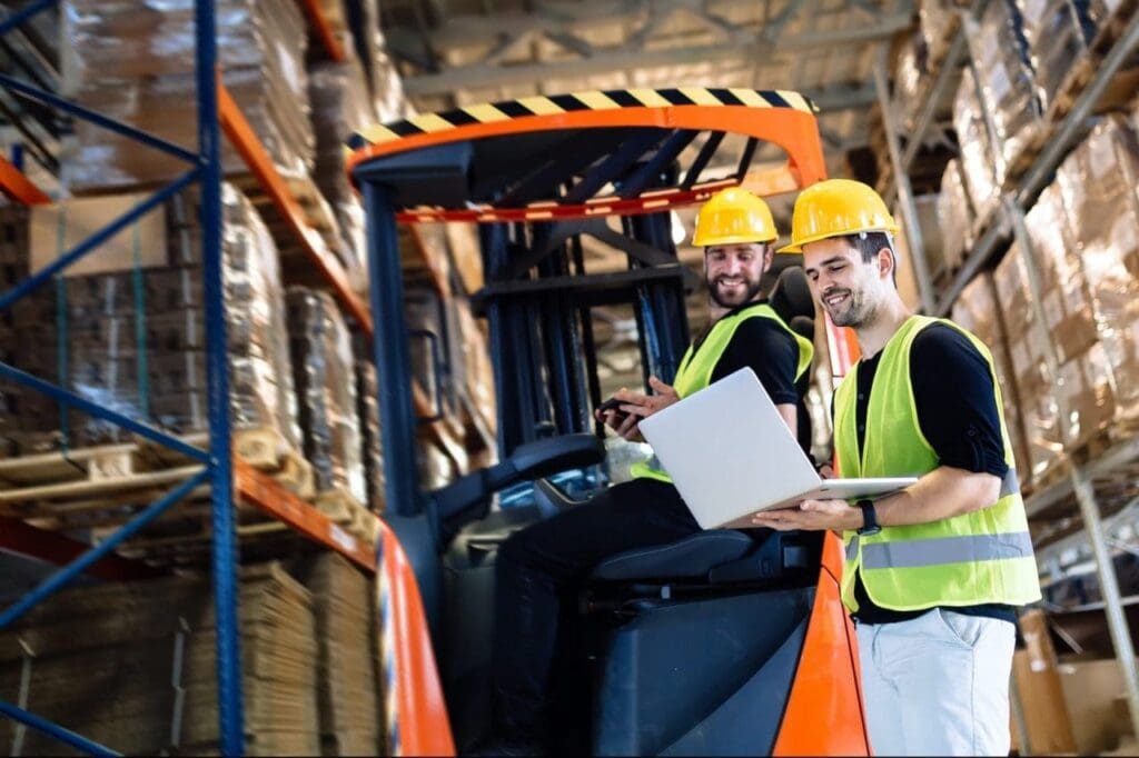 My Proven Process for Smooth Office Moves Across Ottawa and Nepean 6 people working in warehouse e1670342042805