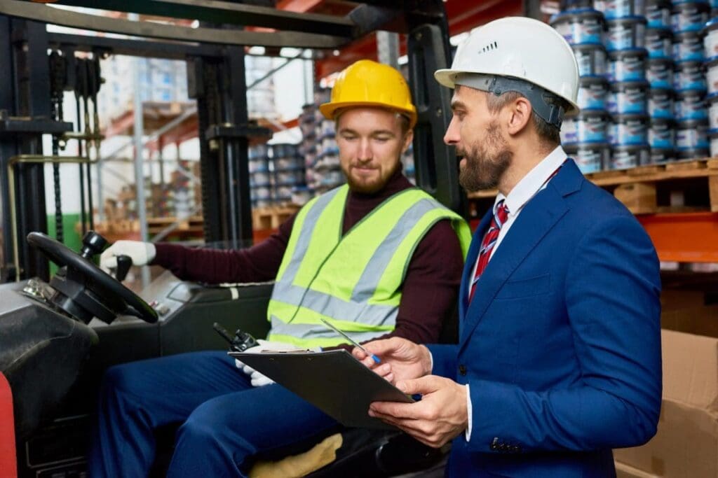 Why I Always Recommend Storage Solutions During Home Transitions in Perth and Westboro 11 warehouse manager instructing mover